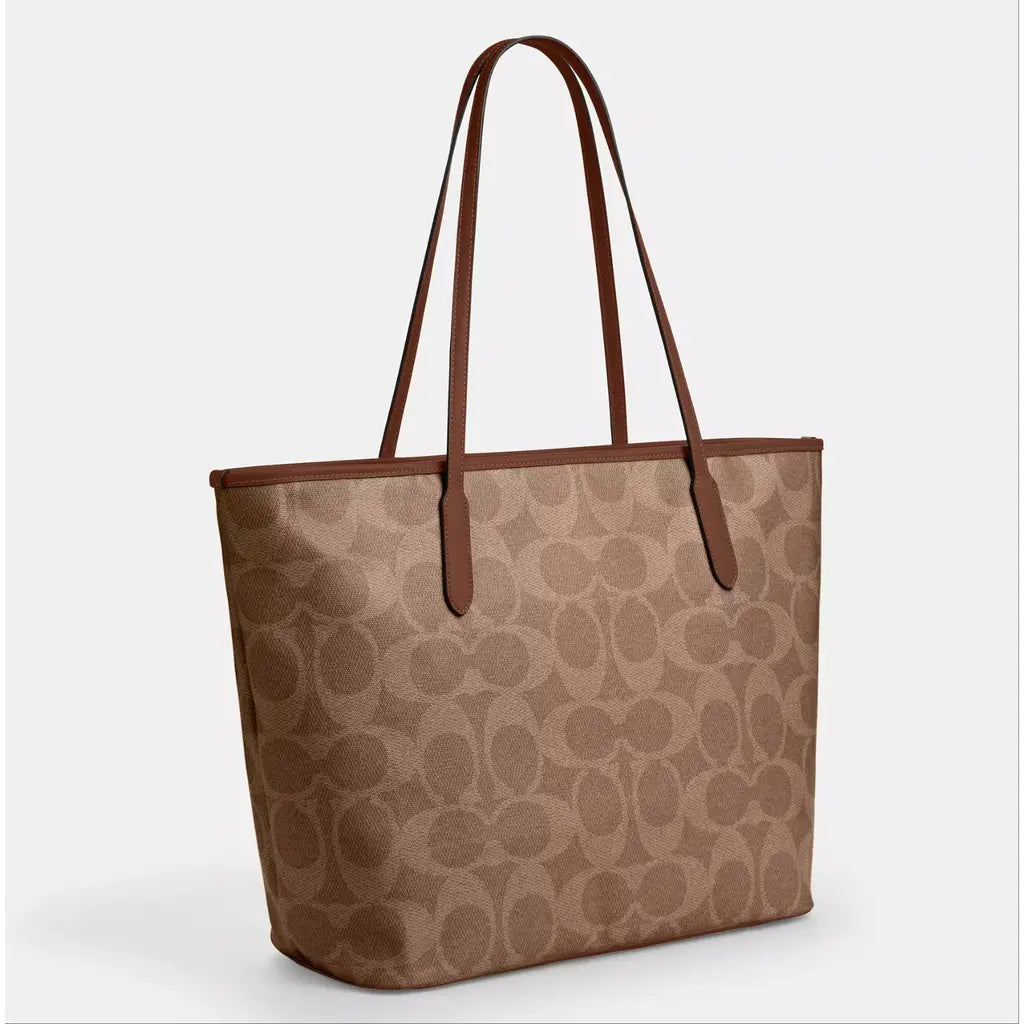 Inspire designer coa,ch  reversible bag